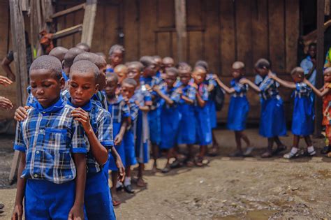 Children Standing Orderly in Line · Free Stock Photo