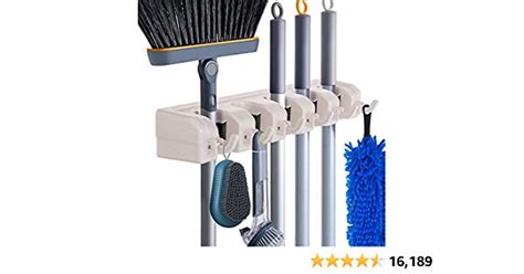 An Image Of A Broom And Brushes Hanging On The Wall With Five Stars