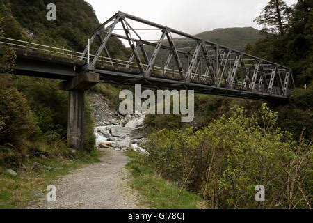 An One Lane Bridge Crosses The Haast River At The Gates Of Haast As A