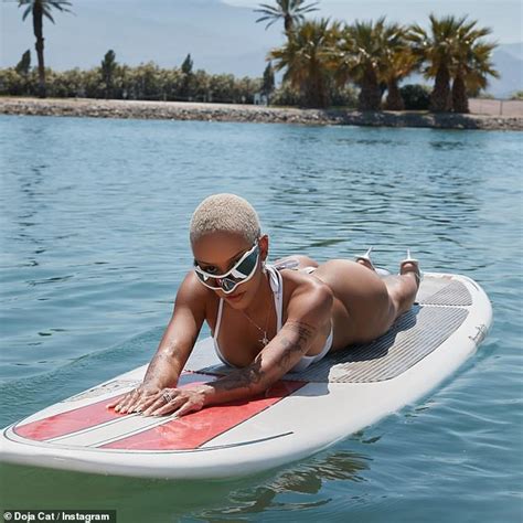 Doja Cat Puts On Very Cheeky Display In Completely Sheer Thong Swimsuit