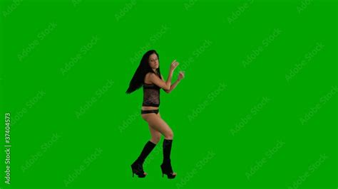 Beautiful Young Girl Dancing Against Green Screen Stock ビデオ Adobe Stock