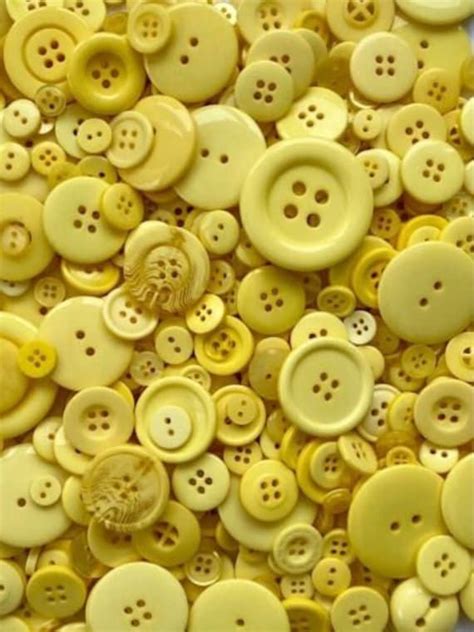 many yellow buttons are shown in this image