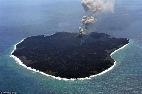 Japanese Island Nishinoshima Emerging From The Sea In Dramatic Pictures