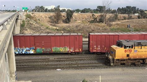 UP 8052 Departing Eastbound Manifest Train Passes Through West Colton