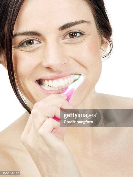 Woman Brushing Teeth Vertical Photos And Premium High Res Pictures