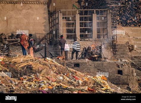 Traditional Funeral On The Banks Of The River Ganges Varanasi India