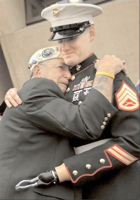 Heartwarming Moment Veteran Embraces Wounded Marine