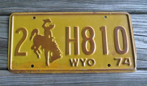 FOR SALE Wyoming Brown Yellow Bucking Horse License Plate 1974