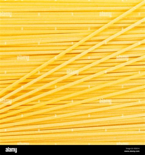 Italian Spaghetti Or Noodle Macaroni Pasta Raw Food Background Or