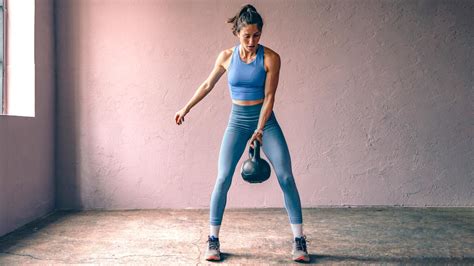 Forget The Gym — This 30 Minute Kettlebell Workout Uses Supersets To Build Stronger Legs And Abs