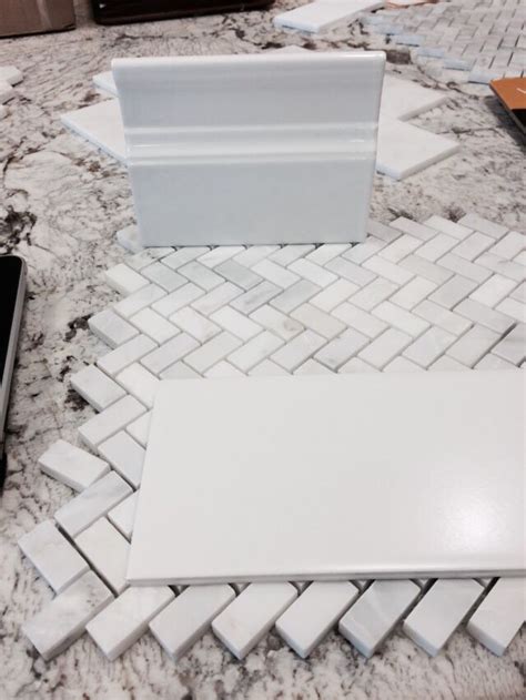 Ceramic tile baseboard, herringbone marble mosaic, 4x8 matte subway tile | Bathroom design ...