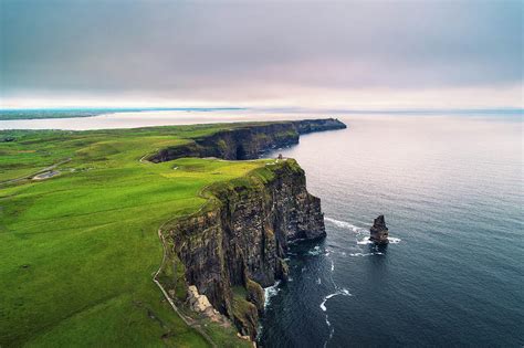 Aerial view of the scenic Cliffs of Moher in Ireland Photograph by Miroslav Liska - Fine Art America