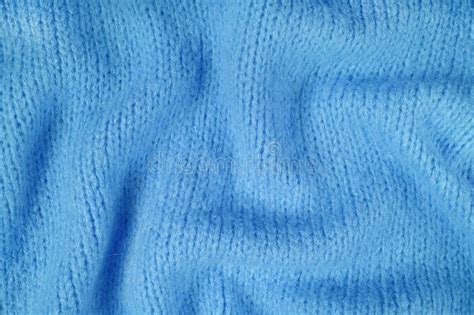 Close Up Background Of Blue Knitted Fabric Made Of Viscose Yarn Soft