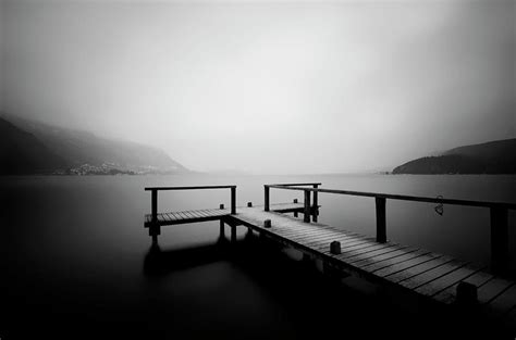 Jetty At A Foggy Lake Annecy Photograph By Imi Koetz Pixels