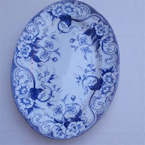 GRAND PLAT ovale en faience Creil et Montereau modèle Flora bleu EUR 70