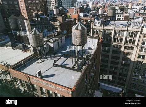 Wooden Water Towers On The Rooftops Of Old Buildings Of New York City