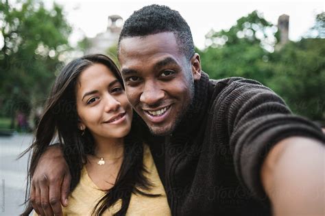 Couple Taking A Selfie In The City By Stocksy Contributor Simone