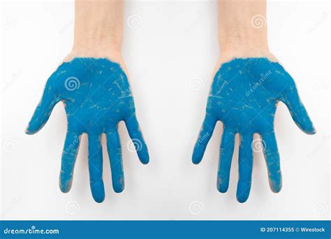 Top View Of Hands Painted Blue Isolated On A White Background Stock