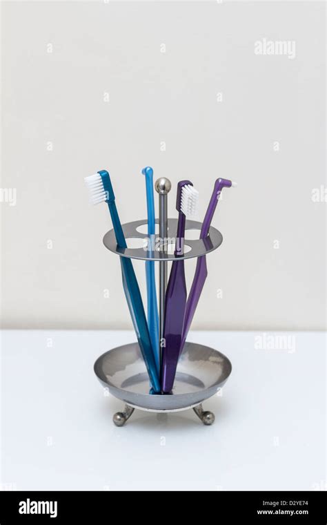 Toothbrushes In Bathroom Stock Photo Alamy