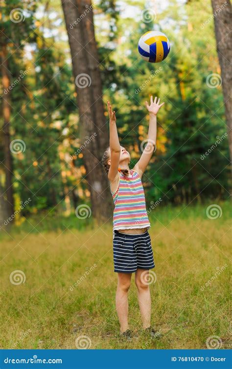 Girl Throwing Ball Stock Photos - Royalty Free Pictures