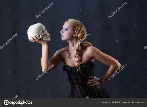 Beautiful Hamlet holding skull Shakespeare halloween Stock Photo by ...