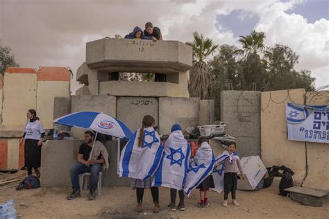 The Latest | Families of hostages held in Gaza launch a 4-day march to demand their freedom