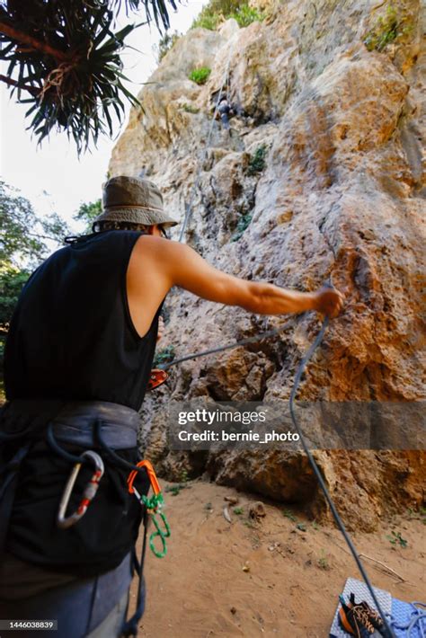 Teamwork Enjoys Climbing Challenges High-Res Stock Photo - Getty Images