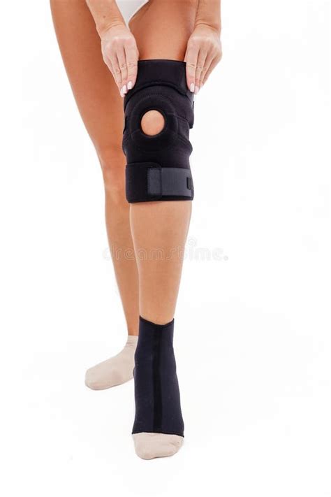 Knee Injury Girl Holds Hands Bandage On His Leg Stock Image Image