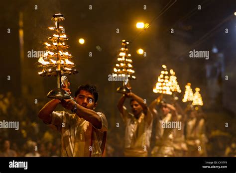 India, Uttar Pradesh, Priests celebrating River Ganges Aarti Stock ...