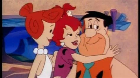 Pebbles Flintstone Gives Her Daddy Fred A Very Nice Hug As Mom Wilma