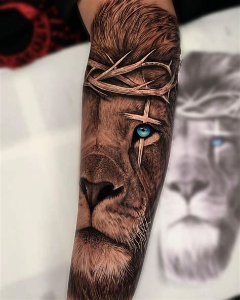 Lion Blue Eyes Tattoo by @gabrielsouza.tattoo - Tattoogrid.net