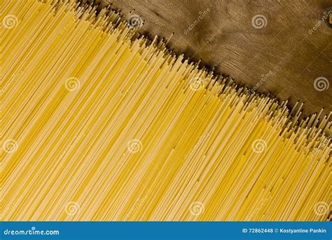 Raw spaghetti noodles stock photo. Image of ingredient - 72862448