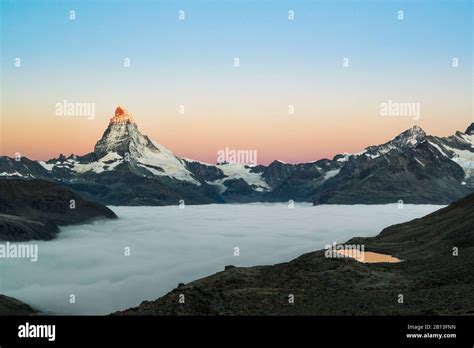 Matterhorn with clouds at sunrise,Switzerland Stock Photo - Alamy