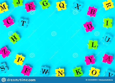 Top View Of English Alphabet From Multi Colored Puzzles Simulator For