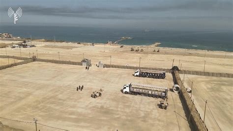 Trucks Begin Transporting Aid From Gaza Pier