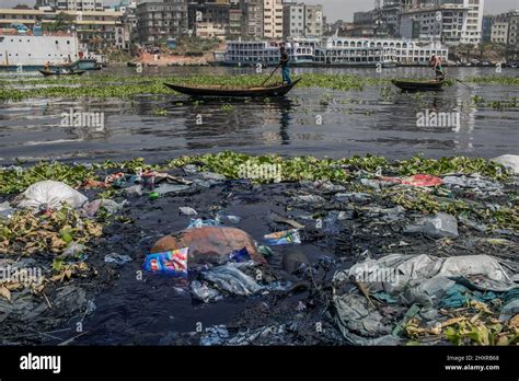 Dhaka Bangladesh 13th Mar 2022 People Cross On A Boat Over The