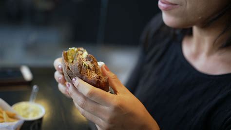 Hispanic Woman Taking Bite Of Burger Latin Stock Footage Sbv 348863064