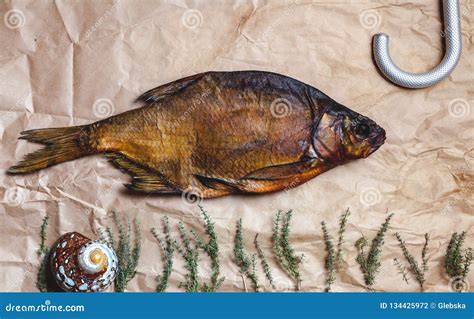 Still Life With Dried Fish And Big Crochet Stock Photo Image Of Paper