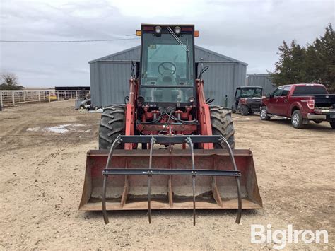 Versatile Bi Directional Wd Tractor W Grapple Loader Bigiron