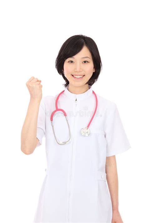 Young Asian Nurse Hold Up Fists Stock Image Image Of Happy Fist 29612149