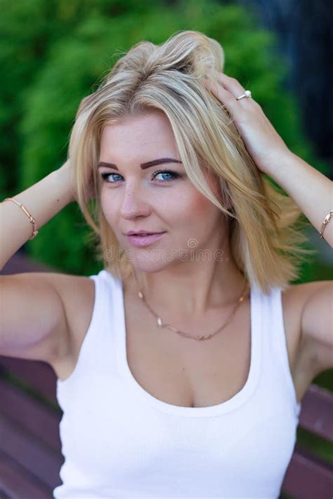 Portrait Of A Beautiful Blonde Outdoors In Summer Stock Image Image Of Blue Face