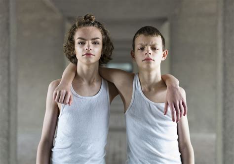 Photographer Captures Identical Twins Next To Each Other To Show How