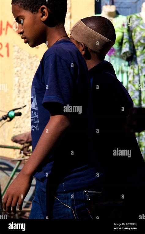 Two Young Ethiopian Boys Walking In The Street Of Wukro Village Tigray