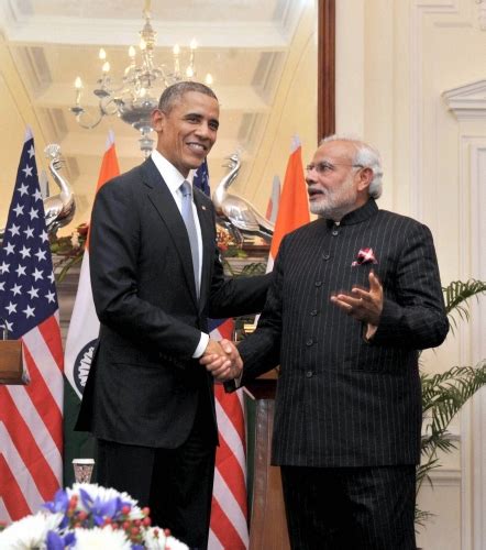 Narendra Damodardas Modi Woven Into Pm S Pinstripe Suit Rediff