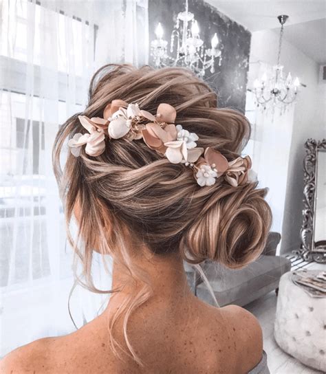 15 Romantic Wedding Hairstyles With Flowers To Look Gorgeous