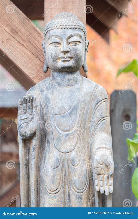 Buddhist Monk Statue With Hands Facing Outward Stock Image Image Of