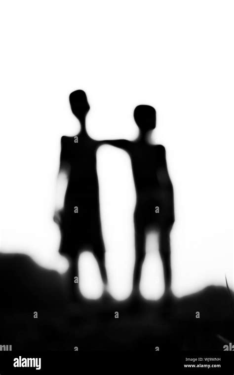 shadow of two friends Stock Photo - Alamy