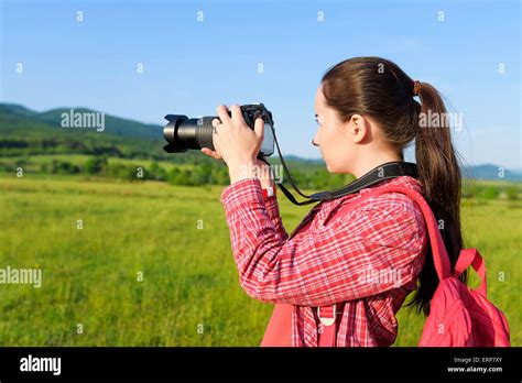 Female Tourist Photographing On Camera Stock Photo Alamy