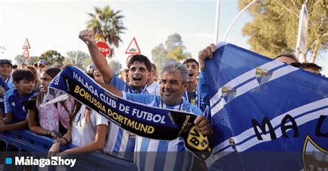 El recibimiento al Málaga CF en Huelva en imágenes