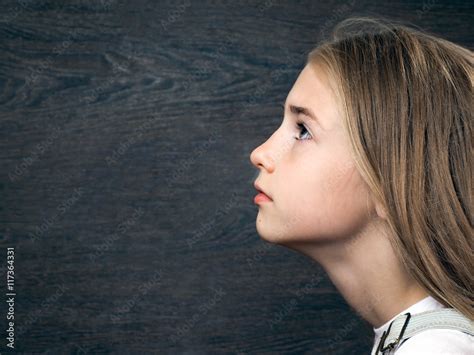 Portrait Of A Teen Girl Face In Profile Blonde Hair The Girl Looks